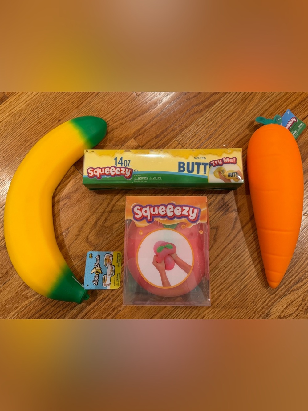 Squeezy Sunny Days Lot of 4  Butter,  Peach, Banana, Carrot
